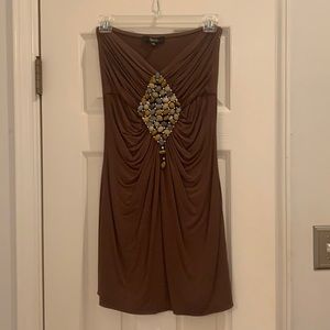 Never worn! Strapless brown top with bust detail
